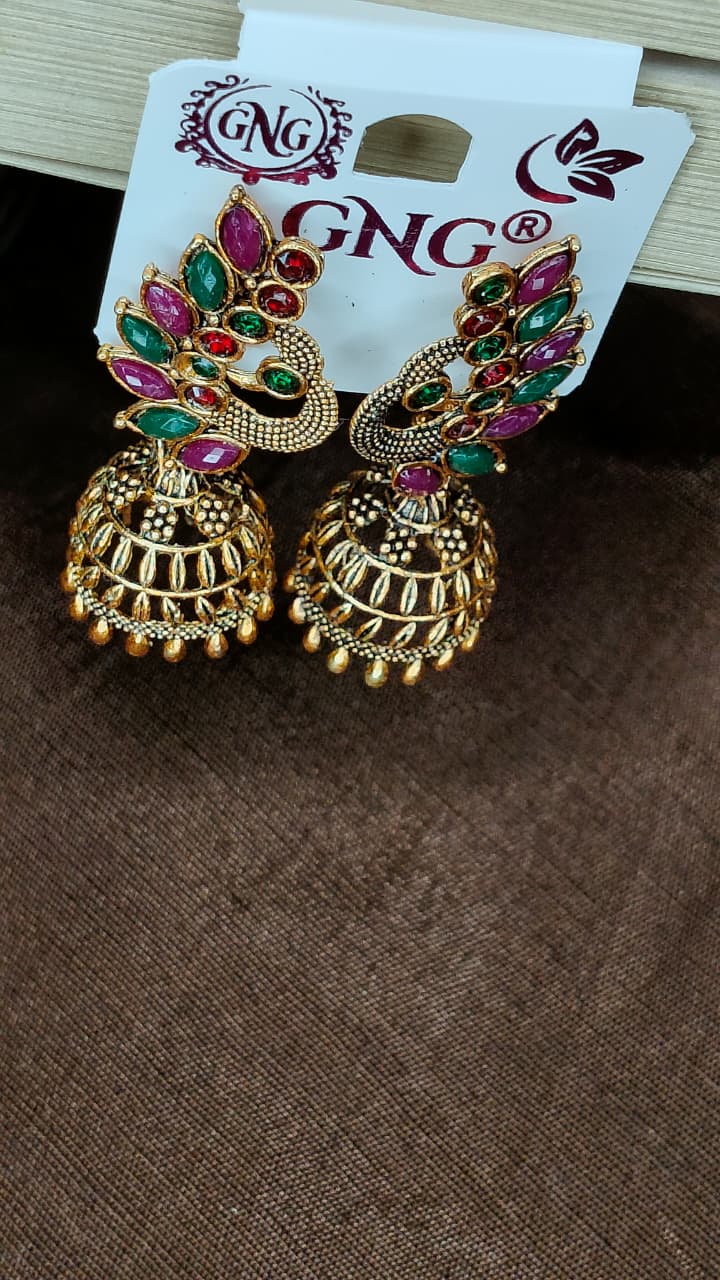 royal gold plated peacock jhumka earrings royal gold plated peacock jhumka earrings
